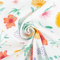 Popeline Baumwollstoff – Happy Flower Field pastellzartes Mint mit bunten Blumen kunstvoll eingedreht in Falten