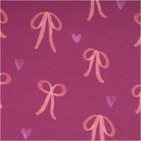 Sweatstoff aus Baumwolle in Fuchsia mit digital gedruckten Schleifen und kleinen Herzen in Rosa und Lila, weich und leicht elastisch - Nahaufnahme