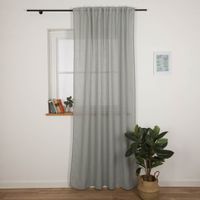 92079-Gardine-Soft-mit-Kombiband-Leinenstruktur-uni-salbeigruen-140-x-245cm--IMG-8179.jpg Gardine Soft in Salbeigrün mit Kombiband präsentiert an einem Fenster, dekoriert mit Büchern und Pflanze – stilvolle Fensterdekoration für Wohn- und Schlafräume