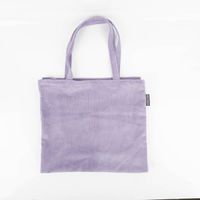 Fliederfarbener Cord-Shopper aus Baumwolle, präsentiert mit weichen Henkeln als geräumige, stylische Tasche von SCHÖNER LEBEN - eingefalten