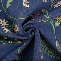 Gobelin Premium Dekostoff blau mit detailreichen Pfauen, Blumenranken, Blättern und Schmetterlingen, reich verziert, edler floraler Tierprint - kunstvoll eingedreht in Falten