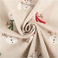 ekostoff Weihnachtsstoff im Leinenlook, naturfarben mit weißen Schneemännern in Mützen und Schals, teils mit Schneebällen oder Weihnachtskugeln verziert - kunstvoll eingedreht in Falten