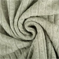 92590-Strickstoff-lindgruen-mit-silberfarbigen-Glitzereffekten-330g-qm-138cm-Breite-IMG-7466.jpg Strickstoff in Lindgrün mit feinen silberfarbenen Glitzereffekten. Elastisch, weich und stilvoll für Kleidung und kreative Nähprojekte - kunstvoll eingedreht in Falten