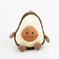 Niedliches Warmies® Avocado-Wärmestofftier mit Lavendelfüllung. Das Kuscheltier in Avocado-Form hat ein fröhliches, aufgesticktes Gesicht und kann in der Mikrowelle erwärmt werden - Nahaufnahme