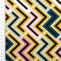 Viskosestoff mit Retro-Zickzackmuster in Senfgelb, Rosa, Mintgrün und Schwarz auf weißem Hintergrund, weich und leicht elastisch, 138 cm Breite - mit Massband