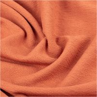Krepp Jersey Stoff aus Baumwolle in Terracotta, elastisch, hautfreundlich und weich mit feiner Struktur, ideal für Bekleidung - stilvoll drapiert
