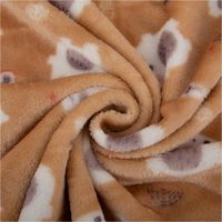 Beiger, kuschelweicher Fleecestoff, präsentiert mit weißen Bärchen, Äpfeln, Birnen und kleinen Motiven als kindliches Design, 1,45 m breit - kunstvoll eingedreht in Falten
