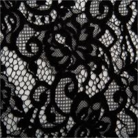Edle Spitze mit Chenille in floralem Dessin, Schwarz – transparent und strukturiert, in Szene gesetzt mit weichem Flor für elegante Kleider, Blusen oder festliche Accessoires - Nahaufnahme