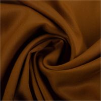 Tencel Lyocell Twill Stoff in Ockergelb mit feinem Glanz und fließend weichem Fall – edel, nachhaltig und angenehm auf der Haut - kunstvoll eingedreht in Falten