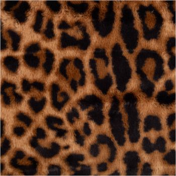 Dieser hochwertige Plüschstoff Fellimitat Leopard braun 1,50m Breite besticht durch seine täuschend echte, weiche Felloptik mit markanten dunklen Flecken auf warmem, braunem Grund. Ein kuscheliger Stoff - Nahaufnahme