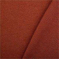 Strickstoff aus 100 % Baumwolle in warmem Rostton, 135 cm breit – weich, atmungsaktiv und ideal für herbstliche Strickmode und Accessoires - mit Rueckseite