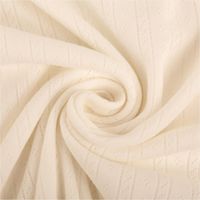 93215-Strickstoff-Ajour-Pointelle-Baumwolle-Streifen-Lochmuster-wollweiss-145-cm-Breite-IMG-2446.jpg Wollweißer Ajour-Strickstoff aus Baumwolle, präsentiert mit feinem Pointelle-Lochmuster in Streifenoptik als leichter Stoff, 145 cm breit - kunstvoll eingedreht in Falten