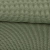 Grobstrick Strickstoff mit Baumwolle, 480g/qm. Detailansicht der schweren, einfarbigen Strickstruktur in Olivgrün, 150 cm breit - ausgerollt und glatt liegend