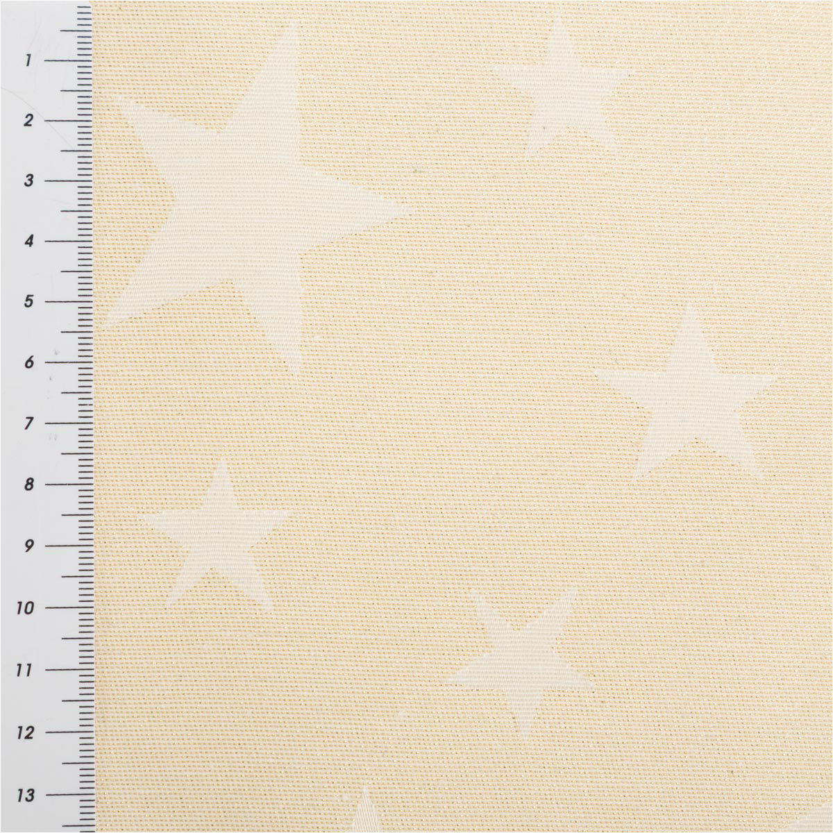 Edler Jacquard Weihnachtsstoff mit elegantem Metallic-Effekt. Große, glitzernde Sterne in Gold zieren den beigefarbenen Grund. Das Deko-Gewebe hat eine Breite von 2,80 Metern - mit Massband