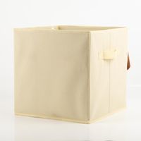 Praktische Aufbewahrungsbox in faltbarem Design mit einem niedlichen Hunde-Gesicht und applizierten Schlappohren in Braun. Die hellbeige Box von Atmosphera bietet mit 29 x 29 x 29 cm idealen Stauraum für das Kinderzimmer - Rueckseite