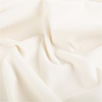 Weißer Samt-Polsterstoff präsentiert mit feiner, glatter Oberfläche, petproof und schwer entflammbar, ideal für Möbel und Vorhänge, 140 cm breit - stilvoll drapiert