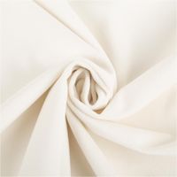 Weißer Samt-Polsterstoff präsentiert mit feiner, glatter Oberfläche, petproof und schwer entflammbar, ideal für Möbel und Vorhänge, 140 cm breit - kunstvoll eingedreht in Falten