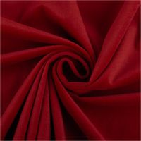 Roter Samt-Polsterstoff präsentiert mit dichter, weicher Oberfläche, petproof und schwer entflammbar, ideal für Möbel und Vorhänge, 140 cm breit - kunstvoll eingedreht in Falten