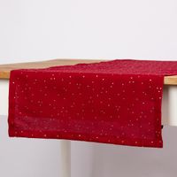 93402-SCHoeNER-LEBEN--Tischlaeufer-aus-Baumwoll-Canvas-in-Rot-mit-Goldpunkten-40x160cm-IMG-3540.jpg Vorderer Bereich eines roten Tischläufers mit Goldpunkten auf hellem Tisch