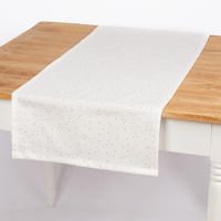 Weißer SCHÖNER LEBEN. Tischläufer aus Baumwoll-Canvas mit goldenen Punkten auf Holztisch.