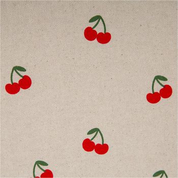 Canvas Stoff mit 70 % Baumwolle im Leinenlook, naturfarbener Grund mit roten Kirschmotiven, fest gewebt, robust, 1,48 m Breite, dekorativ gemustert - Nahaufnahme
