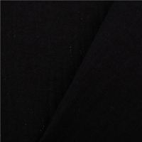 Feiner Musselin Stoff aus reiner Baumwolle in elegantem Schwarz, dezent veredelt mit funkelnden Glitzer-Effekten. Mit einer Breite von 1,35 m eignet sich die luftige Webware hervorragend für festliche Blusen, Tücher oder glanzvolle Kinderbekleidung - mit R