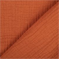 Dieser hochwertige Musselin Stoff Bio Baumwolle einfarbig Cognac Braun 1,30m Breite besticht durch seine weich gecrashte Struktur in einem warmen, erdigen Cognacton. Ein natürliches Bio-Material - mit Rueckseite