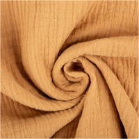 Der hochwertige Musselin Stoff Baumwollstoff Double Gauze uni Kamel-Braun 130 cm besticht durch seine weiche, doppellagige Struktur in einem warmen Erdton. Ein vielseitiges Material für Ihre Nähprojekte - kunstvoll eingedreht in Falten