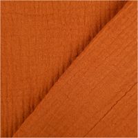 93798-Musselin-Stoff--Baumwollstoff-Double-Gauze-uni-Braun-130-cm-IMG-6770.jpg Der hochwertige Musselin Stoff Baumwollstoff Double Gauze uni Braun 130 cm besticht durch seine weiche, doppellagige Struktur in einem kräftigen, dunklen Erdton. Ein vielseitiges Material für Ihre Nähprojekte - mit Rueckseite