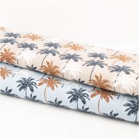 Jersey Stoff Baumwolljersey Palmen blau 1,45m Breite besticht durch tropisches Design für sommerliche, bequeme und stilvolle Nähprojekte in Ihrem Zuhause - mit weiterem Stoff praesentiert