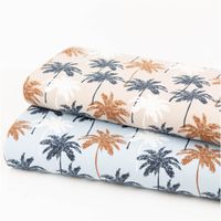 Jersey Stoff Baumwolljersey Palmen sand 1,45m Breite besticht durch tropisches Design für sommerliche, bequeme und stilvolle Nähprojekte in Ihrem Zuhause - mit weiteren Stoffen praesentiert