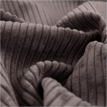 Der hochwertige Cord Polsterstoff Möbelstoff Breitcord Baby Rib charcoal dunkelgrau 1,45m breit besticht durch seine weiche Rippstruktur für moderne, edle und stilvolle Akzente in Ihrem Zuhause - stilvoll drapiert