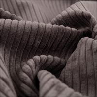 Der hochwertige Cord Polsterstoff Möbelstoff Breitcord Baby Rib charcoal dunkelgrau 1,45m breit besticht durch seine weiche Rippstruktur für moderne, edle und stilvolle Akzente in Ihrem Zuhause - stilvoll drapiert