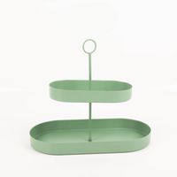 94077-Etagere-oval-Metall-zweistufig-lebensmittelecht-gruen-30x26cm-von-Boltze-IMG-9195.jpg Diese moderne, zweistufige Etagere von Boltze besticht durch ihre elegante ovale Form in mattem Grün. Mit einer Höhe von 30 cm bietet sie stilvollen Platz für Cupcakes, Obst oder kreative Osterdekorationen - Nahaufnahme