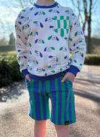 Hochwertiger Bio French Terry mit unregelmäßigen Streifen von Jennifer Bouron in Blau und Grün besticht durch seine weiche Sommersweat-Qualität bei 1,45 m Breite und ist ideal für gemütliche Pullover oder sportliche Freizeitbekleidung - als Hose praesentie