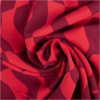 Viskose-Stoff aus Lenzing EcoVero mit großflächigem geometrischem Wellenmuster in Rot und Dunkelrot im grafisch-abstrakten Retro-Stil, 140 cm breit - kunstvoll eingedreht in Falten