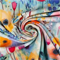 Viskose-Jersey mit großflächigem Aquarell-Digitaldruck einer bunten Blumenwiese in Gelb, Pink, Rot und Lila auf hellblauem Grund, 1,50 m breit - kunstvoll eingedreht in Falten
