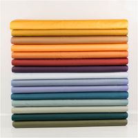 94714-Royal-Micro-Satin-Stoff-Meterware-gelb-1-40m-Breite-IMG-4111.jpg Royal Micro Satin Meterware in leuchtendem Gelb, 1,40 m breit – seidig glatte Oberfläche mit feinem Glanz im strahlenden Sonnengelb, als Rolle fotografiert, frisch und energiegeladen kombinierbar - mit weiteren Stoffen praesentiert