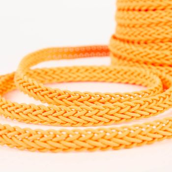 Neonborte Flechtborte neon orange 1,5cm Breite Geflochtenes orangefarbenes Band Nahaufnahme