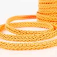 Neonborte Flechtborte neon orange 1,5cm Breite Geflochtenes orangefarbenes Band Nahaufnahme