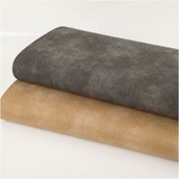 Baumwoll-Popeline „Vintage Washed", 1,40 m breit, in Schwarz mit grafischem Bogenmuster in Ton-in-Ton – dezent strukturiert, zeitlos und vielseitig für Mode oder anspruchsvolle Dekorationsprojekte - in Szene gesetzt