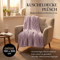 94914-Kuscheldecke-Pluesch-Breitcord-Streifen-lila-150x200cm-IMG-6481-1.jpg Lila Plüschdecke mit Breitcord-Struktur, dekorativ über einem Sessel drapiert, Größe 150 x 200 cm.