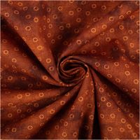 Baumwollpopeline mit goldenen Kreisringen auf dunkelbraunem Vintage-Washed-Untergrund – satt changierendes Rostbraun, weich und leicht. Breite: 1,40 m. Ideal für Näh- und Quiltprojekte - kunstvoll eingedreht in Falten