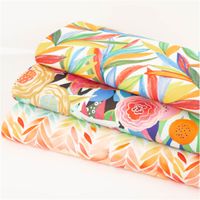 95060-Outdoor-Stoff-Canvas-Aurelia-Blaetter-ZigZag-wollweiss-bunt-wasserabweisend-von-Swafing-1-47m-Breite-IMG-5365-1.jpg Wasserabweisender Outdoor-Canvas „Aurelia" von Swafing, 1,47 m breit, in Wollweiß mit aquarelliertem Zickzack-Blattmuster in Gelb, Orange, Rot, Mint, Blau und Grün – farbenfroh und wetterfest - in Szene gesetzt