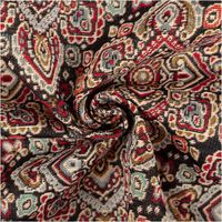 Jacquard-Gobelin mit feinem orientalischen Medaillon-Ornamentmuster in Rot, Gold, Hellblau und Creme auf schwarzem Grund – detailreich gewebt, edel & zeitlos. Ideal für Kissen & Polster. 140 cm breit - kunstvoll eingedreht in Falten