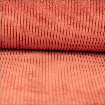 Cord Stoff Breitcord 4.5w uni Ziegelrot 150cm Detailaufnahme eines gerippten Stoffes in warmem Terrakotta mit klarer Linienstruktur.