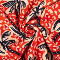 Musselin Stoff Baumwollstoff Palmen Leo rot schwarz 1,50m Breite Detailaufnahme von Stoff mit rotem Palmenmuster in Blau-Weiss, kunstvoll gedreht.