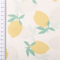 Baumwollstoff Popeline Stoff Zitronen wollweiß gelb 1,45m Breite Hellgelber Baumwollstoff mit Zitronenmuster und Meterstab, zeigt gleichmäßiges Muster in Pastellfarben.