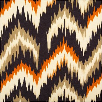Viskose Jersey Marie Chevron terra schwarz beige von Swafing 1,50m Breite Detailaufnahme des Zickzackstoffs mit orange-braunen und cremefarbenen Mustern.