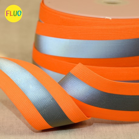 Neonoranges Gummiband mit reflektierendem Streifen, 3,8 cm b Neonoranges Gummiband mit reflektierendem Streifen, 3,8 cm breit, auf einer Spule